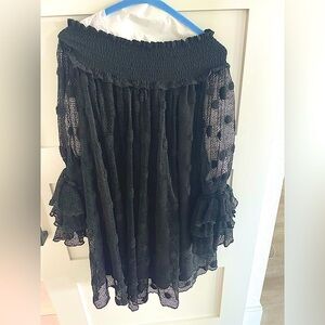 Gorgeous with sheer lace arms- worn one time
It is a small - I wear size 6–8